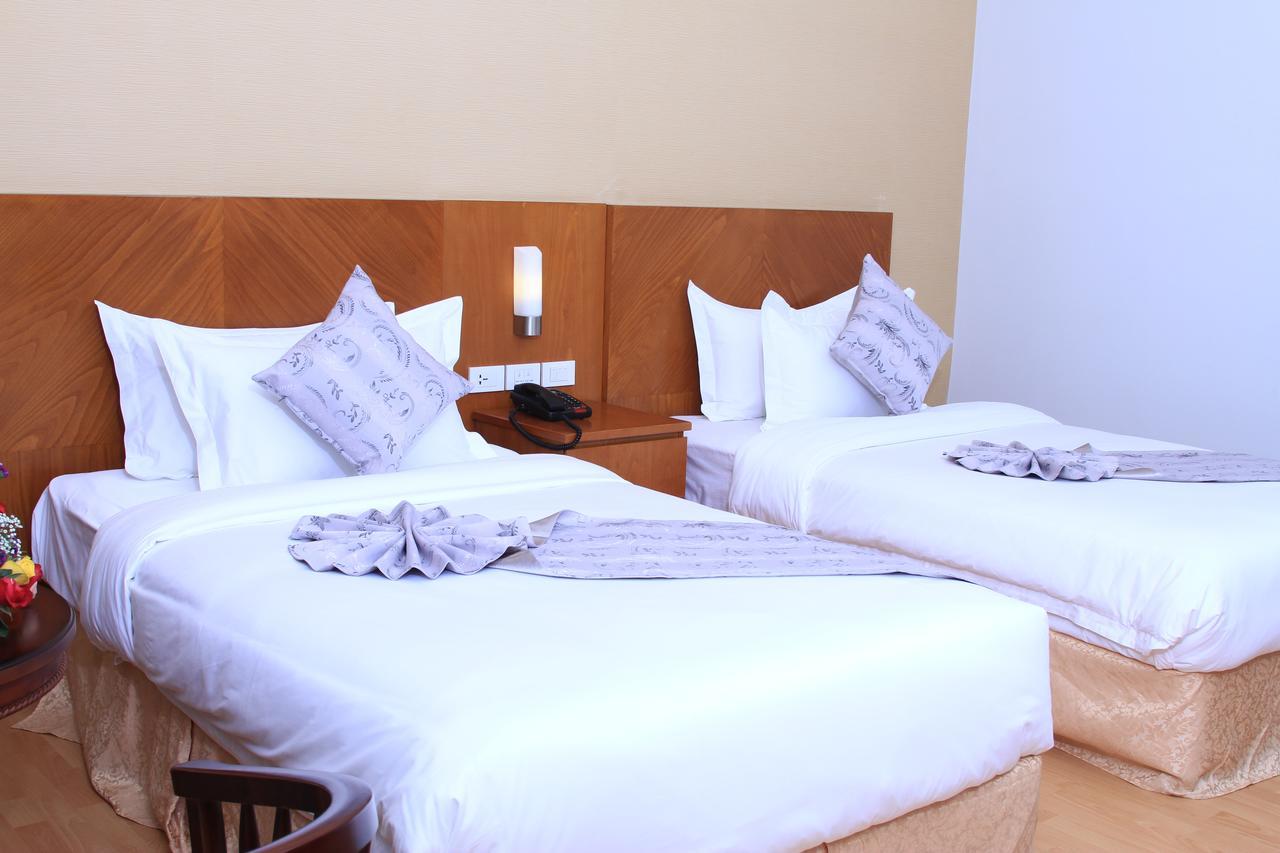Azzeman Hotel Аддис-Абеба Экстерьер фото