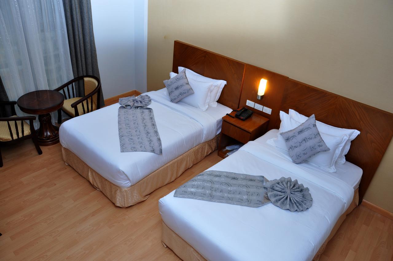 Azzeman Hotel Аддис-Абеба Экстерьер фото